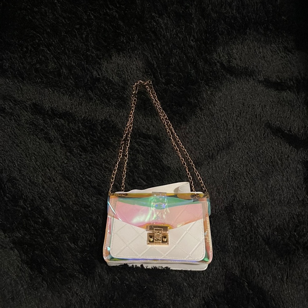 Small but casual metallic golden strap bag, it’s can be styled in many ways .